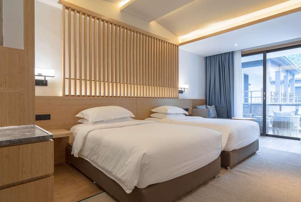 Howard Johnson Huashuiwan Hot Springs Resort Chengdú Habitación foto